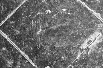 evocative black and white image of rhombus shaped ancient floor texture 
