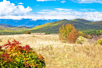 Lika. Scenic landscape of rural region of Lika and Velebit mountain background