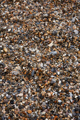 close up of small rocks at the beach