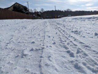 frosty country road covered with snow