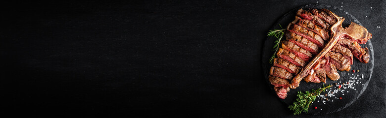 American cuisine. Sliced and roast T-bone or porterhouse beef meat Steak for steakhouse menu. Long...