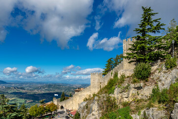 A glimpse of the ancient walls of the fortified city of San Marino in the homonymous Republic
