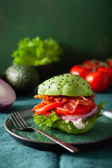 keto paleo diet avocado burger with bacon, lettuce, tomato