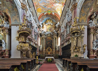 Fototapeta na wymiar Brno, Czech Republic. Choir and altar of Church of the Assumption of the Virgin Mary, also known as Jesuit Church. The church was built in 1598-1602 and modified in the 17th and 18th centuries.