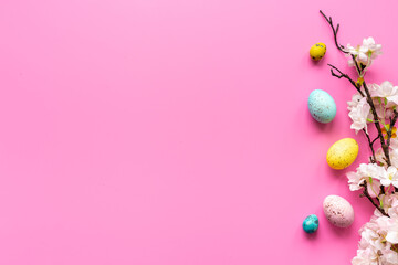 Happy Easter with eggs and flowering branch, top view