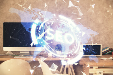 Double exposure of SEO drawing and office interior background. Concept of Search optimization...