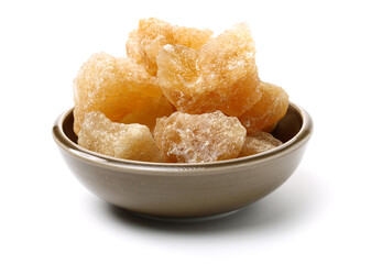 brown crystal sugar on white background