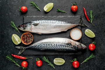 Fresh raw mackerel fish on stone background