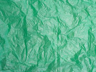 Crumpled paper texture for background. Green paper.