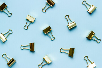 Stationery pattern. Paper binder clips top view