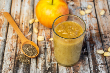 Fruit smoothie with fresh ingredients, smoothie with apple, kiwi  and chia seeds. healthy diet eating, superfood. Selective focus
