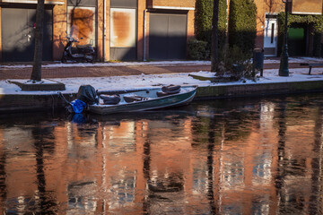 Fototapeta na wymiar Frozen canals in Leiden, Netherlands after storm Darcy hit, February