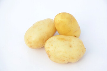 the yellow ripe potato isolated on white background.