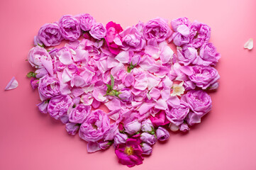  heart shape against pink background. romantic and beauty concept . top view