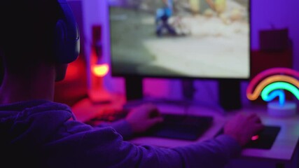 Young gamer playing online video games while streaming on social media - Youth people addicted to new technology game - Powered by Adobe