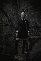 Witch in the form of a student in the forest