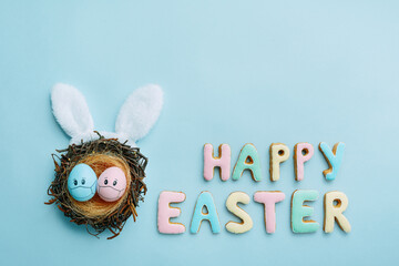 Homemade cookie letters in the inscription Happy Easter. Easter composition for the holiday