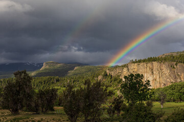 Rainbow view over the Andes mountain in Los Alerces National Park, Patagonia, Argentina	