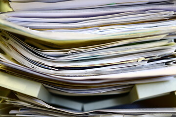 Pile of papers, stack of documents, data, old archives. 