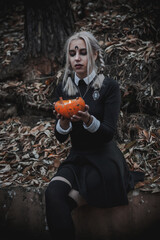 Naklejka premium Witch in the form of a student in the forest