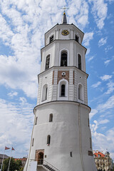 Fototapeta na wymiar Cathedral Bell Tower (from XIII century) at Cathedral Square (Katedros aikste) - one of the oldest and tallest towers (52 m) in Vilnius Old Town. Vilnius, Lithuania.