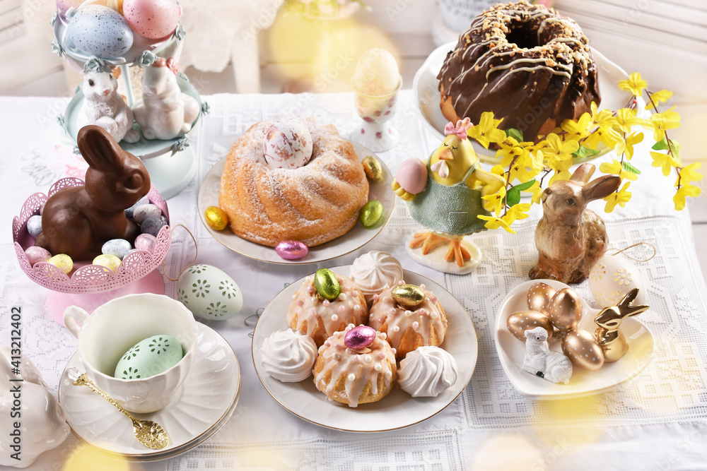 Wall mural traditional easter variety of cakes on festive table