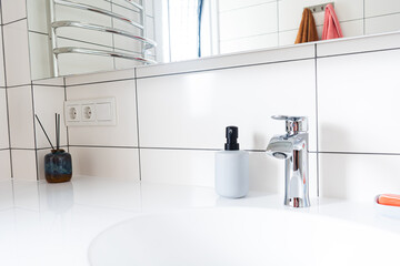 Fototapeta na wymiar modern light bathroom interior with mixer, mirror