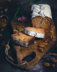 Still life with delicious cake and fresh berries on dark background