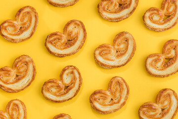 close up of cookies on yellow background