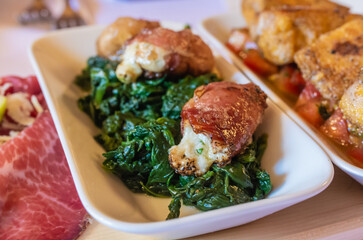 pork rolls with spinach. Typical dish from northern Italy. Italian cuisine