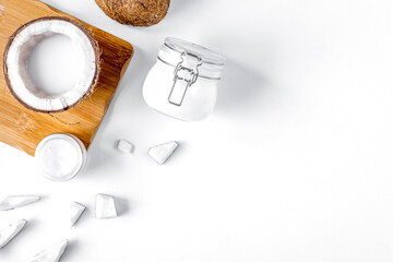 organic cosmetics with coconut on white background top view mockup