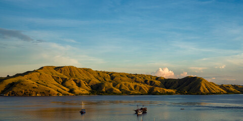 beautiful landscape of Padar Island and Gili Lawa Island in the sunset time. Both of the islands located in komodo islands in labuan Bajo Indonesia. This is also the UNESCO international heritage.  © alfin