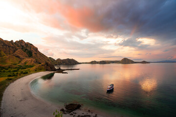 beautiful landscape of Padar Island and Gili Lawa Island in the sunset time. Both of the islands located in komodo islands in labuan Bajo Indonesia. This is also the UNESCO international heritage.  © alfin