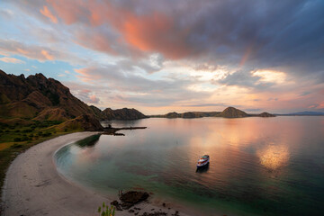 beautiful landscape of Padar Island and Gili Lawa Island in the sunset time. Both of the islands located in komodo islands in labuan Bajo Indonesia. This is also the UNESCO international heritage.  © alfin