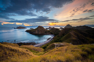 beautiful landscape of Padar Island and Gili Lawa Island in the sunset time. Both of the islands located in komodo islands in labuan Bajo Indonesia. This is also the UNESCO international heritage.  © alfin