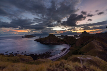 beautiful landscape of Padar Island and Gili Lawa Island in the sunset time. Both of the islands located in komodo islands in labuan Bajo Indonesia. This is also the UNESCO international heritage.  © alfin
