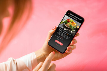 Woman ordering gluten-free food online