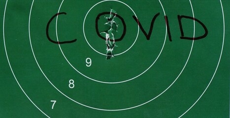 A large paper green target that says 