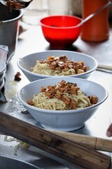 yummy chicken noodle in a bowl