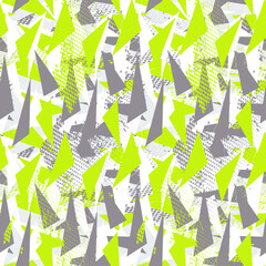 Seamless urban pattern with chaotic triangle shapes and grunge spots