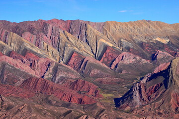 Argentina, Qebrada de Hornocal, famous for the richness of its minerals and its nuances ... A riot of color,.The mountains reach an altitude of 4,761 meters above sea level.World Heritage Site in 2003 - obrazy, fototapety, plakaty