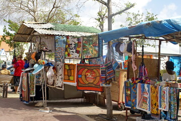 Textiles for sale at a stall in a tourist market in Willemstad, Curacao
