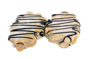 Sweet cake coated with sugar and icing.