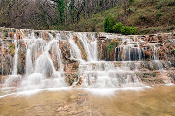 Fototapeta premium wild waterfall in vizcaya in spain in the town of delika in the river nervion