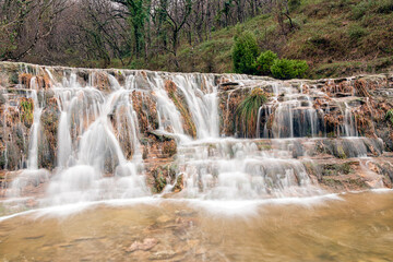 wild waterfall in vizcaya in spain in the town of delika in the river nervion