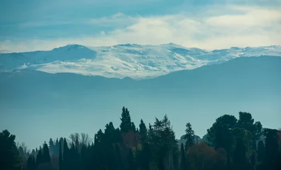 Crédence de cuisine en verre imprimé Forêt dans le brouillard Landscape of a snowy mountain in Spain