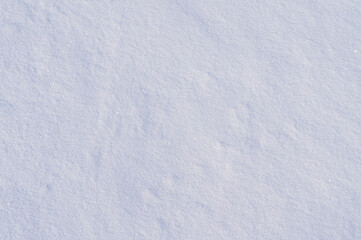 Light texture of winter snow close up