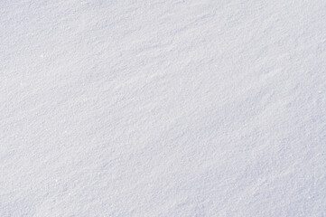 Light texture of winter snow close up