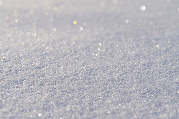 Light texture of winter snow close up
