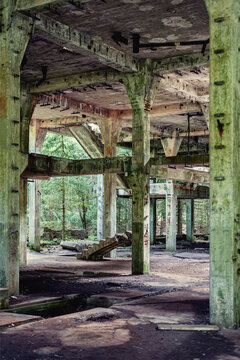 View of remains of a building. Urbex concept. Vintage tin mine in the middle of the forest in Czech Republic. Creepy place.